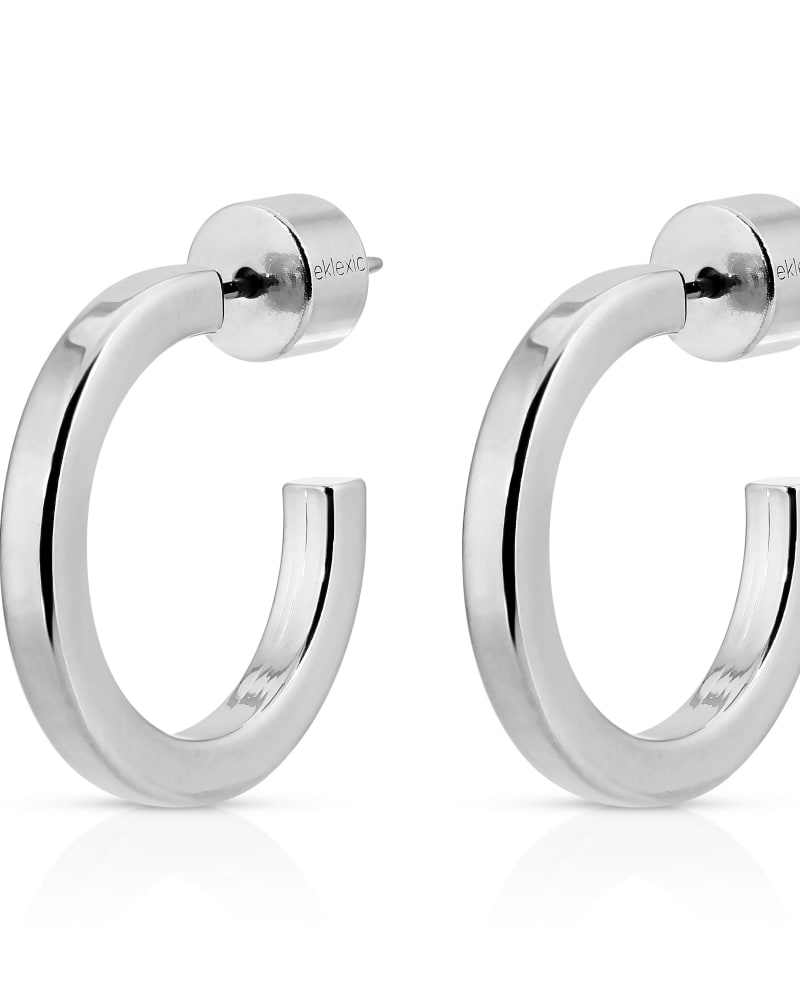 Front of a size one-size-fits-all Mini Ava Huggie Hoops Silver in Silver by Eklexic. | dia_product_style_image_id:282793